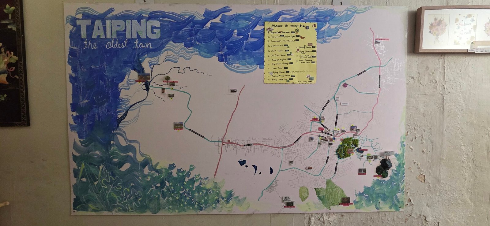 Hand-drawn Taiping map displayed on a wall inside Sojourn Beds & Cafe